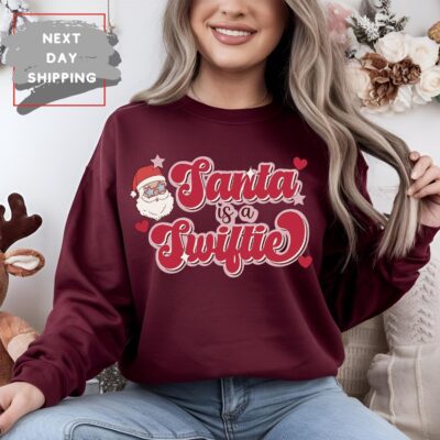 Santa Is A Swiftie Christmas Sweatshirt, Funny Santa Swiftie Crewneck, Holiday Swiftie Gift, Taylor Swift Christmas Shirt, Next Day Shipping